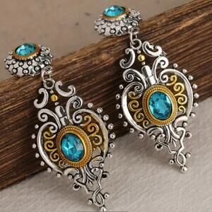 Elegant Silver and Gold Filigree Earrings with Blue Accents